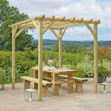 Wooden pergola with a dining table and benches in a garden setting