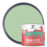 A can of Thorndown wood paint in front of an open round paint can showing the light sage green color. The can features a red and white label with a stylized green cat logo.