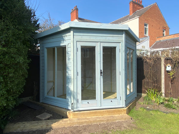 Why should you get a corner summerhouse?