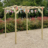 Wooden pergola with colorful flags in a garden setting