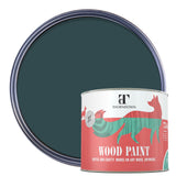 A can of Thorndown wood paint in front of an open round paint tin showing the color. The paint color is a dark slate blue-green.